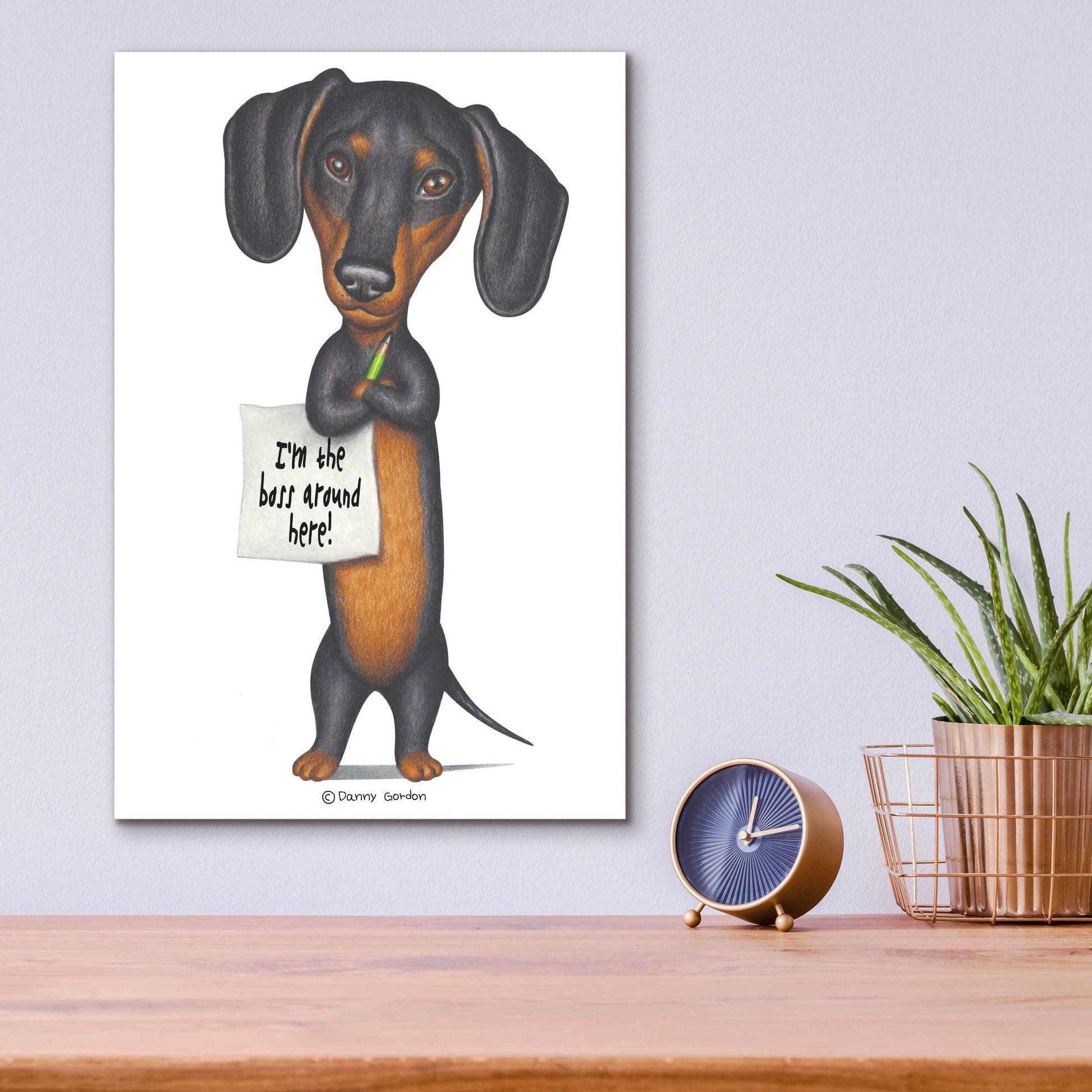 Epic Art 'Black Dachshund Holding Green Pencil' by Danny Gordon Art, Acrylic Glass Wall Art,12x16