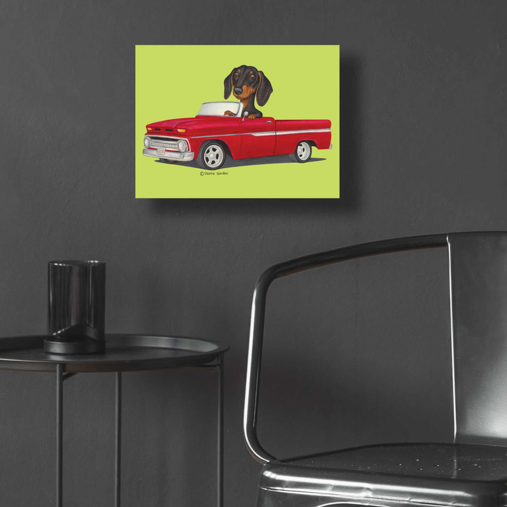 Epic Art 'Black Dachshund in Red Truck' by Danny Gordon Art, Acrylic Glass Wall Art,16x12