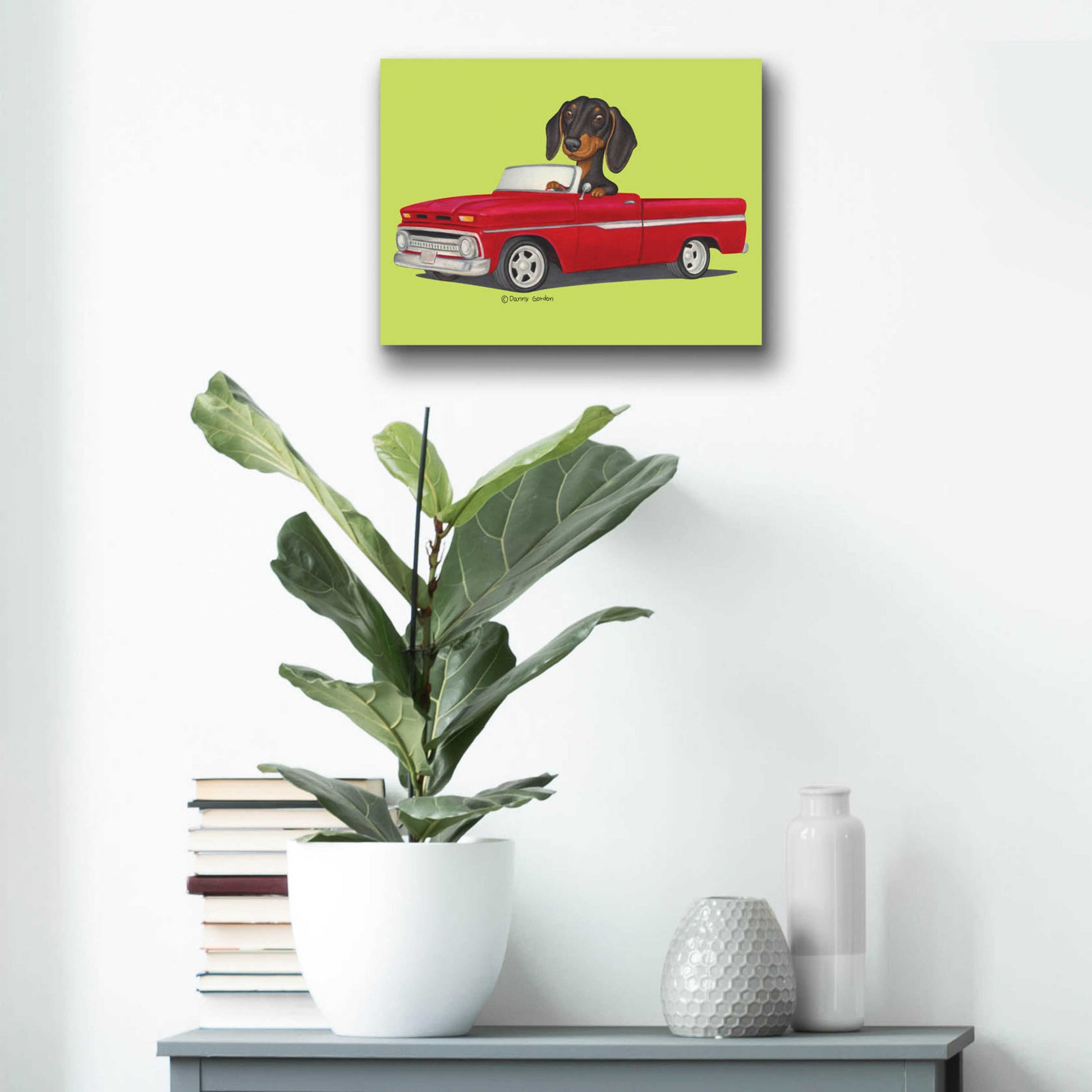 Epic Art 'Black Dachshund in Red Truck' by Danny Gordon Art, Acrylic Glass Wall Art,16x12