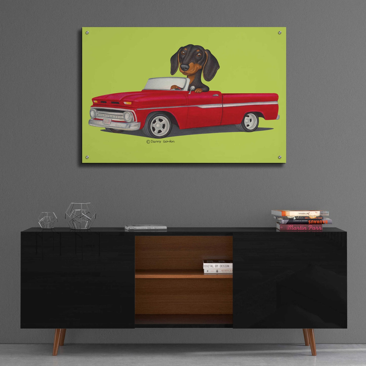 Epic Art 'Black Dachshund in Red Truck' by Danny Gordon Art, Acrylic Glass Wall Art,36x24