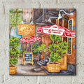 Cafe Cupping Room Ext Summer by Andrea Strongwater - 12x12 acrylic wall art in a room