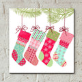 Stockings by Art Licensing Studio - 12x12 acrylic wall art in a room